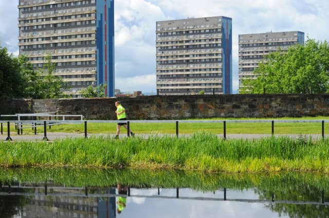 The man's body was found in his tenth-floor flat in Maryhill, Glasgow. Picture: Robert Perry