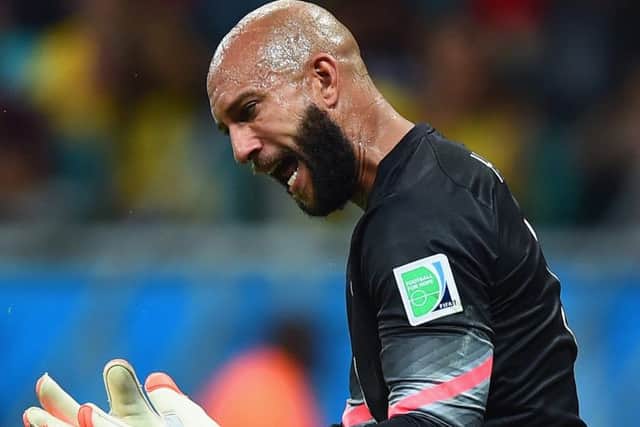 Tim Howard gees himself up during his superb performance against Belgium. Picture: Laurence Griffiths/Getty