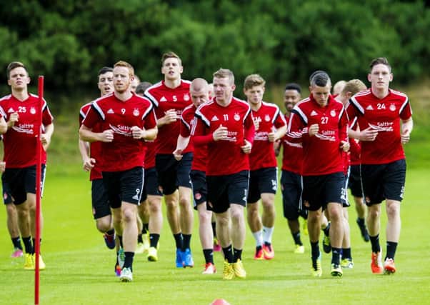 The Aberdeen squad are put through their paces ahead of the Europa League clash. Picture: SNS