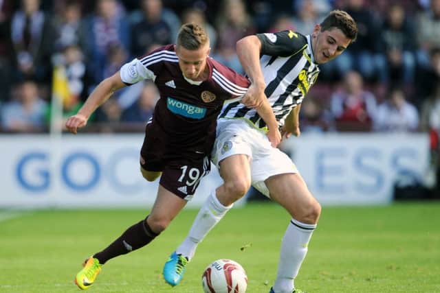 Kenny McLean takes on Billy King in a match at Tynecastle in October 2013. Picture: Jane Barlow