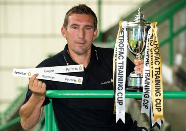 New Hibernian manager Alan Stubbs is on hand as he finds out his side will be facing Rangers in the first round of the Petrofac Training Cup. Picture: SNS
