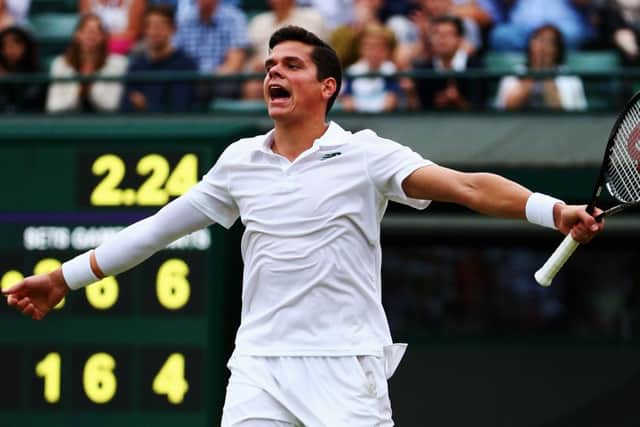 Milos Raonic celebrates after beating Australian Nick Kyrgios in four sets at Wimbledon yesterday. Picture: Getty