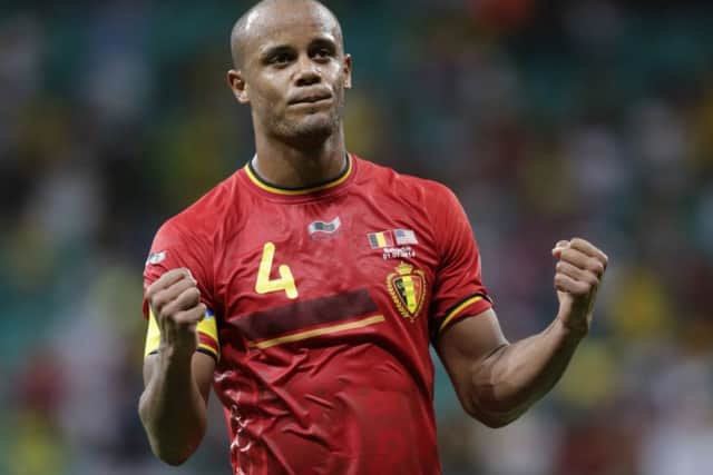 Vincent Kompany celebrates after Belgiums thrilling last-16 defeat of the USA in the Arena Fonte Nova. Picture: AP