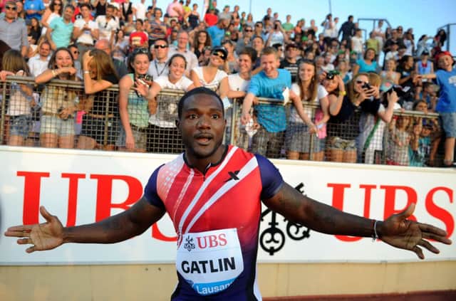 Justin Gatlin reacts after winning the 100m in 9.80 seconds at the Diamond League meeting in Lausanne yesterday. Picture: Getty