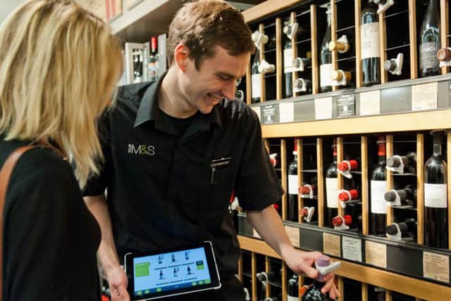 Marks & Spencers buying wine with tablet device. Picture: Contributed