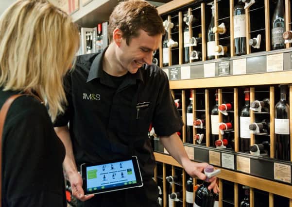 Marks & Spencers buying wine with tablet device. Picture: Contributed