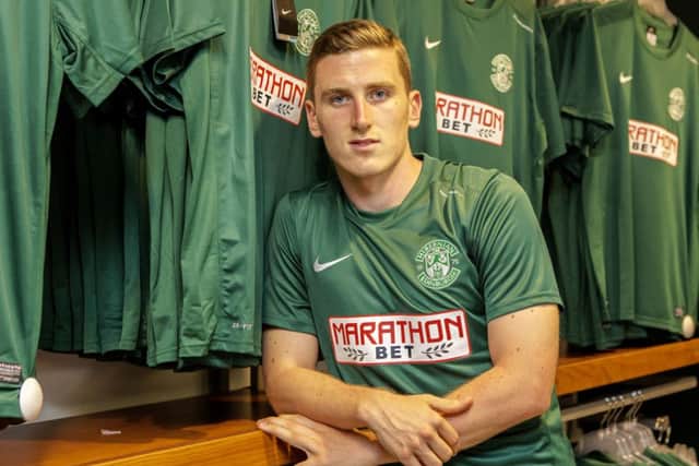 Hibs defender Paul Hanlon models the new kit. Picture: Malcolm McCurrach