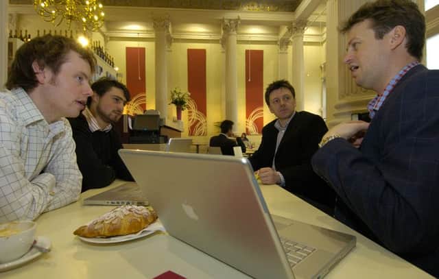 Coffee shops are becoming the places to do business. Picture: TSPL
