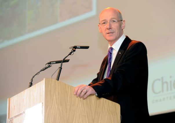 The Treasury warns that Mr Swinney's sums don't add up. Picture: TSPL