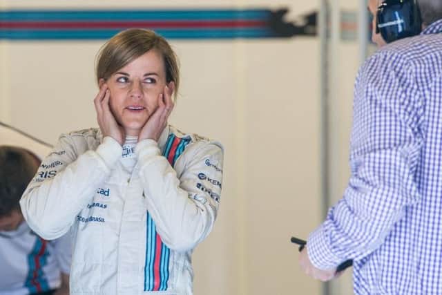 Top, Susie Wolff in practice at Silverstone, which ended, above, in mechanical failure after only four laps. Picture: Ian Georgeson
