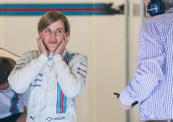 Top, Susie Wolff in practice at Silverstone, which ended, above, in mechanical failure after only four laps. Picture: Ian Georgeson