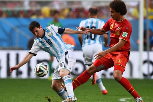 Lionel Messi and Axel Witsel clash for the ball. Picture: Getty