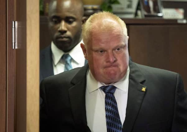 Toronto Mayor Rob Ford arrives at City Hall in Toronto after his stay in a rehabilitation facility. Picture: AP