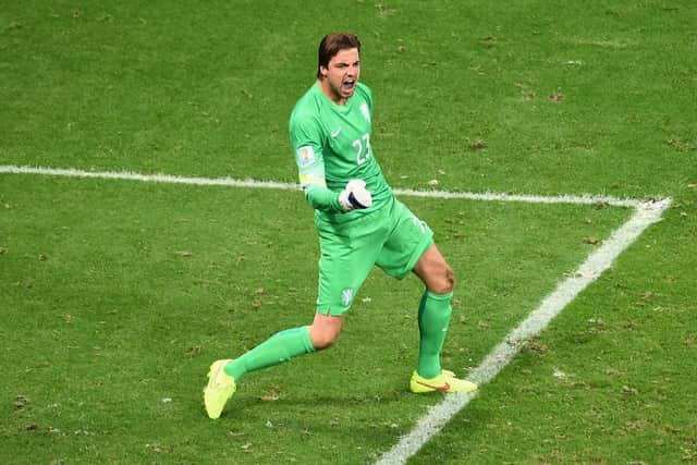 Goalkeeper Tim Krul of the Netherlands celebrates after making a save on a penalty kick by Bryan Ruiz. Picture: Getty