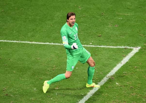 Goalkeeper Tim Krul of the Netherlands celebrates after making a save on a penalty kick by Bryan Ruiz. Picture: Getty