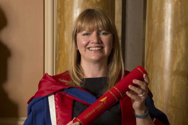 Tanya Ewing with her honorary doctorate from Napier University, which she collected last week