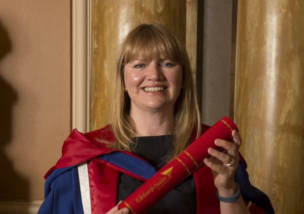 Tanya Ewing with her honorary doctorate from Napier University, which she collected last week