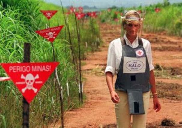 The late Diana, Princess of Wales, tours an Angolan minefield in Halo Trust body armour. Picture: John Stilwell