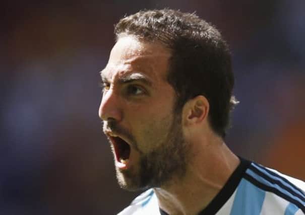 Gonzalo Higuain celebrates his goal which took Argentina into a semi-final against the Netherlands. Picture: Reuters