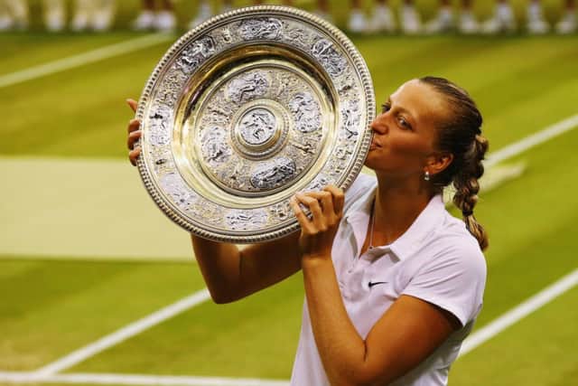Petra Kvitova kisses the Venus Rosewater Dish after winning her second Wimbledon title. Picture: Getty Images