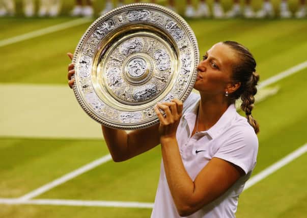 Petra Kvitova kisses the Venus Rosewater Dish after winning her second Wimbledon title. Picture: Getty Images