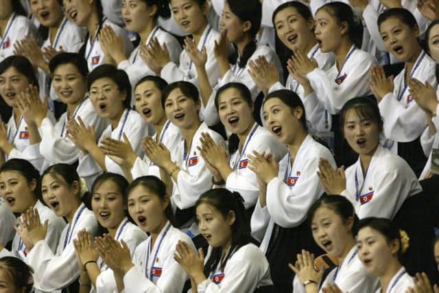 The army of beauties gets more attention than the athletes. Picture: AP