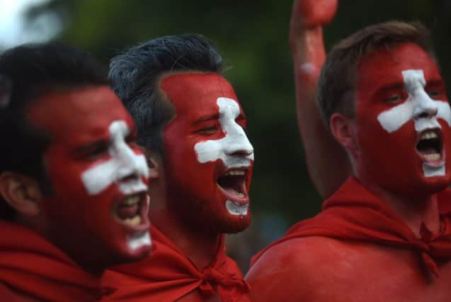 Switzerland fans sing their anthem at the World Cup. Picture: Getty