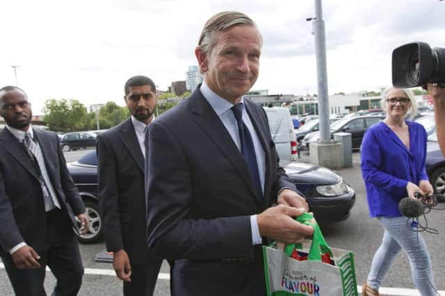 Marc Bolland is the focus of media attention as he leaves yesterdays AGM. Picture: Getty