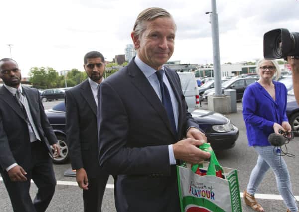Marc Bolland is the focus of media attention as he leaves yesterdays AGM. Picture: Getty