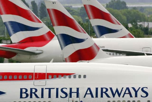 Shares in British Airways owner IAG were down 7 per cent. Picture: Getty