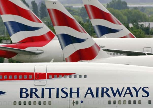 Shares in British Airways owner IAG were down 7 per cent. Picture: Getty