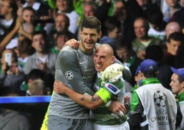 Fraser Forster is a target for Benfica, while skipper Scott Brown is out for three months with a hamstring injury. Picture: Robert Perry