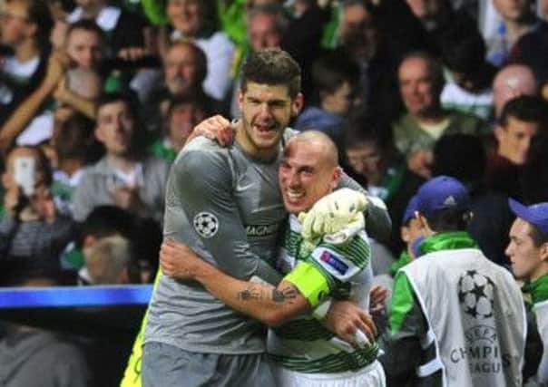 Fraser Forster is a target for Benfica, while skipper Scott Brown is out for three months with a hamstring injury. Picture: Robert Perry