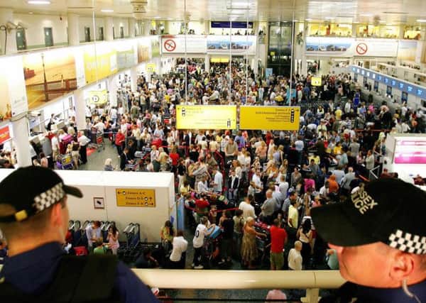 Passengers face further delays at airports as checks are introduced on mobile devices such as phones and laptops. Picture: Getty