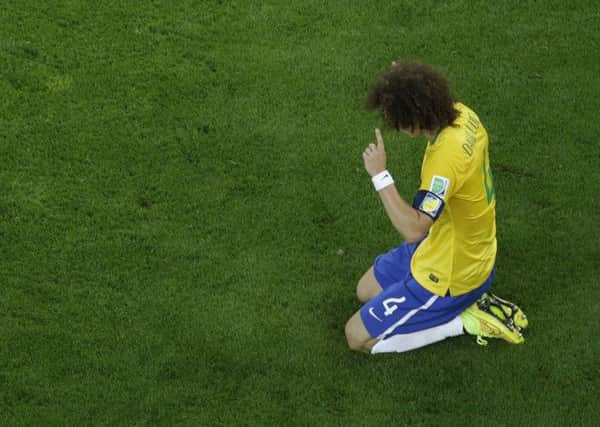 Brazil's defender David Luiz after the loss. Brazil were the teenager's favourite team and she was devastated by their defeat. Picture: Getty