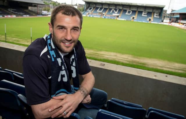 Former Hibs midfielder Kevin Thomson is enjoying his football again after his move to Dundee. Picture: SNS
