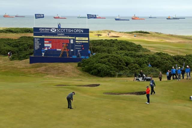 Phil Mickelson putts on the 18th hole during the first round at Royal Aberdeen yesterday. Picture: Getty