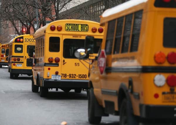 FirstGroup will try to defend the near doubling of Tim OTooles pay despite its school bus operation in the United States underperforming. Picture: Getty