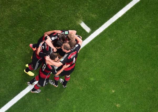 Togetherness is the key for German bid to change a national stereotype and end their trophy drought. Photograph:  Francois Xavier Marit/AFP/Getty Images