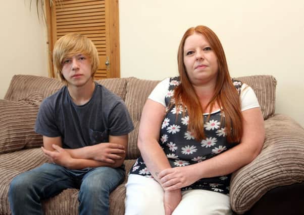 Owen Abbot, 15, and his mum Nicola Stewart. Owen was sent home from hospital to be readmitted later that day. Picture: SWNS
