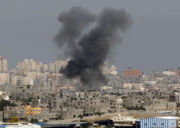 Smoke rises following an Israeli strike on Gaza, seen from the Israel-Gaza border. Picture: AP