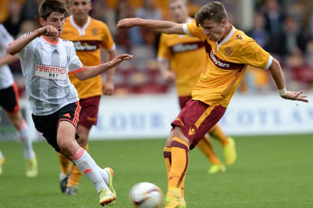 Motherwell kid Dom Thomas tries a shot on goal. Picture: SNS