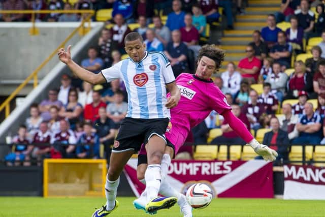 Silk purse out of a Sows ear: Osman Sow dispossesses East Fifes keeper Allan Fleming to score Hearts third goal. Photograph: Craig Foy