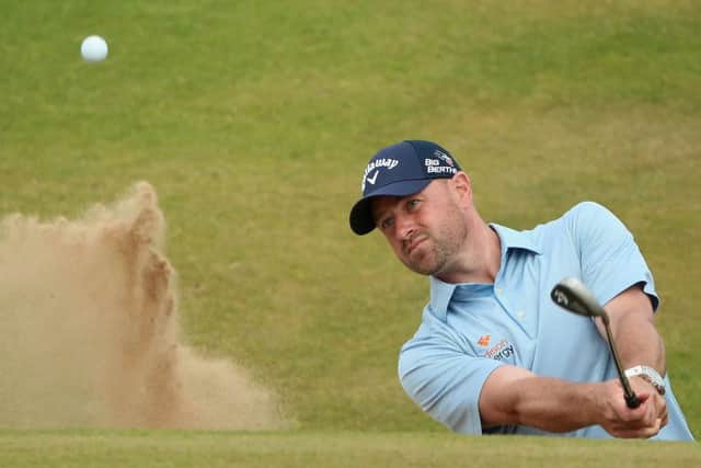 Craig Lee plays a bunker shot on the 16th hole during the Scottish Open at Royal Aberdeen yesterday on his way to an impressive 66 in trying conditions. Photograph: Andrew Redington
