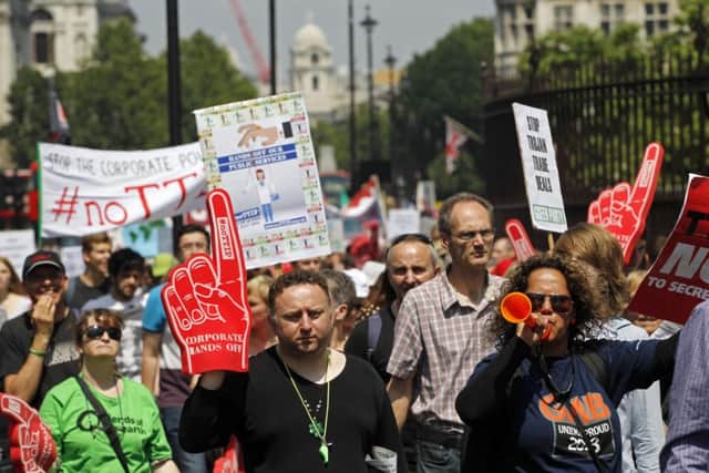 Protestors demonstrate against the deal between the European Union and the United States, known as the Transatlantic Trade and Investment Partnership (TTIP), in London. Picture: PA