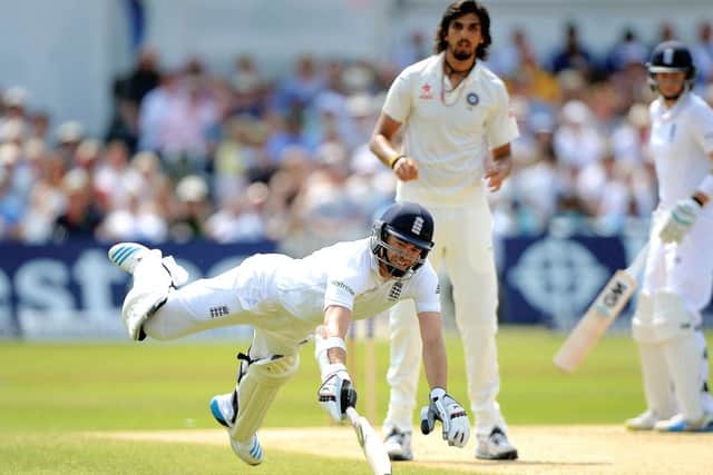 Man on a mission: James Anderson lunges for the crease as he and Joe Root struck up a tenth-wicket partnership that brought a milestone of 198 runs. Photograph: Gareth Copley/Getty