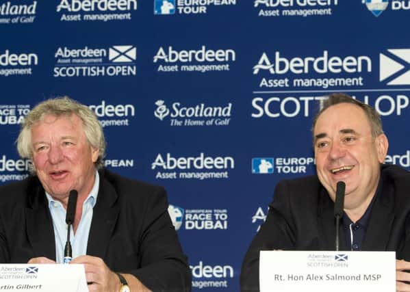 Alex Salmond joins Martin Gilbert as Gullane Golf Club is announced as the 2015 Scottish Open host. Picture: SNS