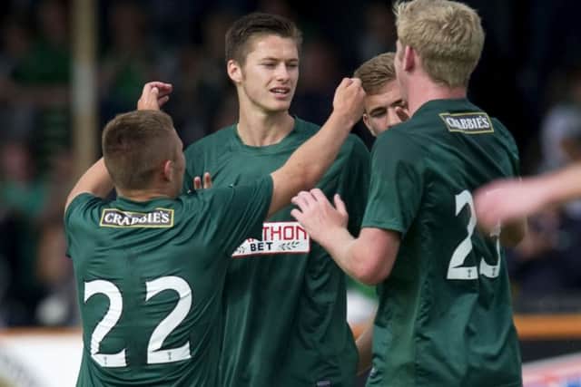 Hibernians Tom Gardiner (centre) celebrates his first senior goal with his team-mates. Picture: Garry Williamson/SNS