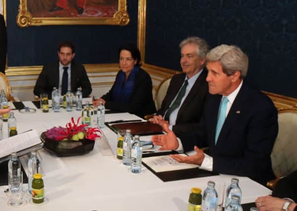 German foreign minister FrankWalter Steinmeier and John Kerry, took the opportunity to discuss espionage. Picture: AP