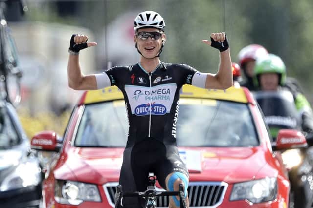 Germanys Tony Martin celebrates as he wins yesterdays ninth stage of the Tour de France. Picture: AFP/Getty